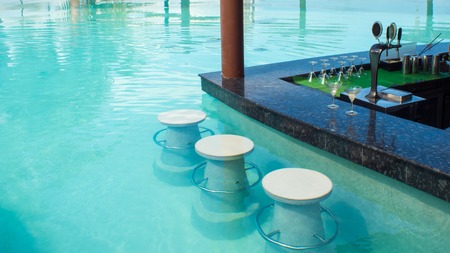 The bar in the pool. Luxury resort on tropical iseland. Hotel terrace