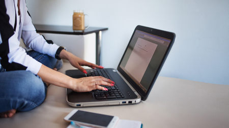 Young female student or entrepreneur working from home. Remote work, modern lifestyle
