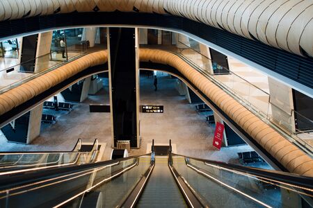BAKU, AZERBAIJAN - APRIL 28, 2018: Modern airport terminal escalator up to the departures area. Waiting room before the flightのeditorial素材