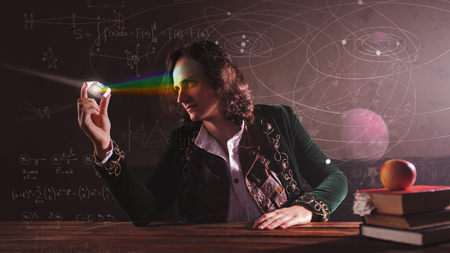 History of science, concept. Isaac Newton and physics. The science of light, optics. Light refraction and scientific research in physics.の写真素材