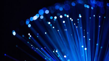 Abstract spherical background, optical fiber blue luminous dots and lines, digital conceptの写真素材