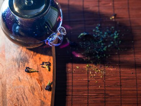 Blue Thai tea in a glass teapot. Freshly brewed tea, delicious and healthy hot drink. Hot drink on...
