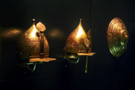 ISTANBUL, TURKEY - SEPTEMBER 21, 2019: Ancient Turkish weapons in the Museum. Helmets for combat, protectionのeditorial素材