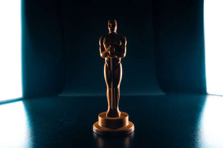 SAINT PETERSBURG, RUSSIA - MAY 8, 2020: Academy award statuette. Chocolate Oscars, movie awards, illustrative editorialのeditorial素材