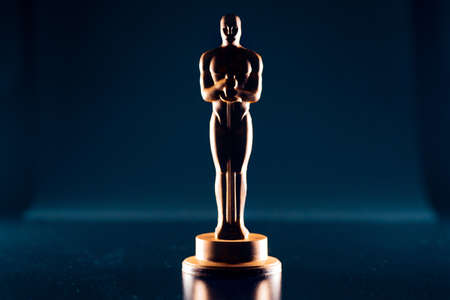 SAINT PETERSBURG, RUSSIA - MAY 8, 2020: Academy award statuette. Chocolate Oscars, movie awards, illustrative editorialのeditorial素材