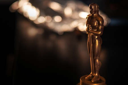 SAINT PETERSBURG, RUSSIA - MAY 8, 2020: Academy award statuette. Chocolate Oscars, movie awards, illustrative editorialのeditorial素材