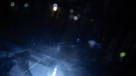 texture of dirty glass, the surface of the glass with prints, white blotches on a black background...