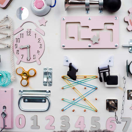 children's educational Board, various tactile elements for the development of motor skills of the babyの写真素材