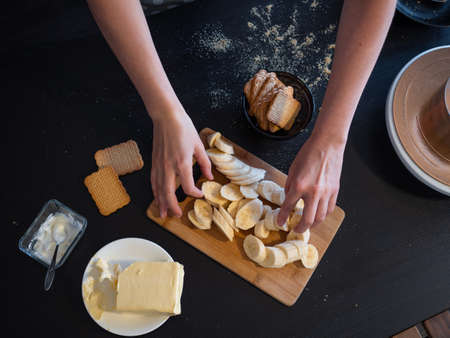 Cooking Banoffi cake at home in the kitchen, pastry recipe.