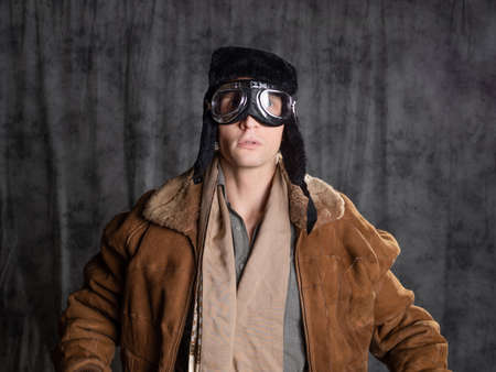 The dreamer. Retro style aviator in a flying hat with goggles,の写真素材