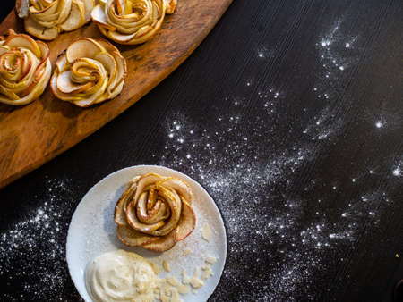 Apple roses, apple buns, serving with whipped cream and almond petals,の写真素材