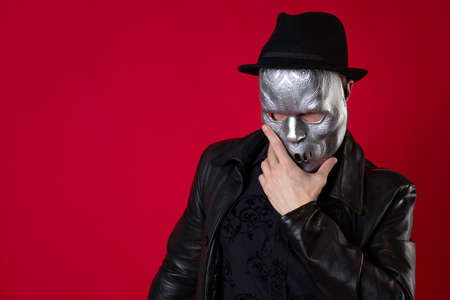 A mysterious ninja assassin in a noir style. A man in black leather clothesの写真素材