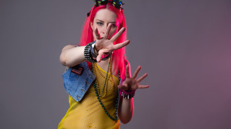 Futuristic fashion, a young bright and attractive woman with pink hair,の写真素材