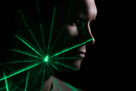 idea came, the concept. A young man with a projection of a green flash on his face, man and...