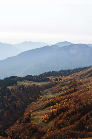 Brown autumn mountain peaks. Beautiful mountain landscape. freedom and beauty of nature. Autumn view of the Caucasus mountains in Russiaの写真素材