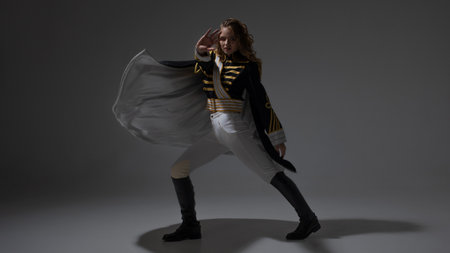 A glamorous blonde in a carnival uniform with epaulettes, posing with pretentious poses, a show host...