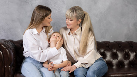 happy family communicates, three generations of women together. Mom, adult daughter and her daughter...