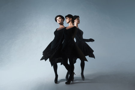 The versatility of personality and different social masks, the concept. portrait in the style of multi-exposure, identical figures in different posesの写真素材