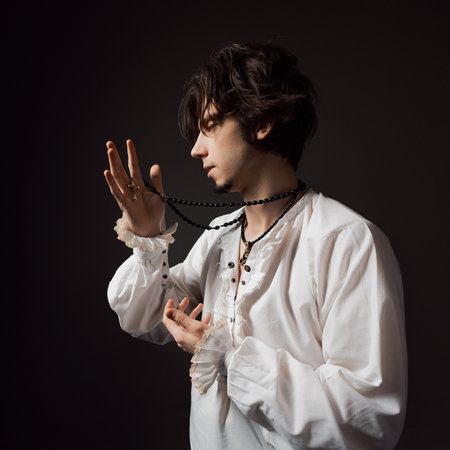 The dramatic hero calls out to the gods in the pose of a praying man, the style of classical...