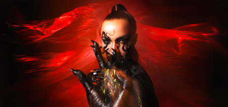 Snake woman, stylish and daring woman, snake pattern makeup, bright photo on a red background,...