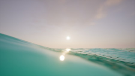 A serene ocean view with calm waves, clear water, and a distant horizon. Minimalistic and peaceful, the scene features white clouds and a tranquil sky, ideal for summer or travel themes.の写真素材