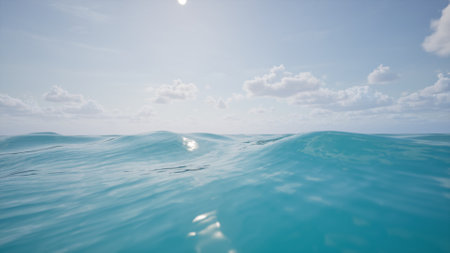 Minimalistic landscape, peaceful sea scene, ocean waves, clear water lapping at camera level, white clouds in the sky, calm and beautiful natural backgroundの写真素材