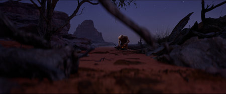 Ancient man made fire, the history of the evolution of the human mind, concept. A person in the desert at night, makes fire by hitting flints of stones against each otherの写真素材