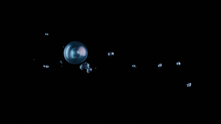 3D visualization of water bubbles and liquid balls floating and splashing chaotically on a dark background. The scene captures the essence of underwater breathing, ideal for abstract patterns or templates.の写真素材