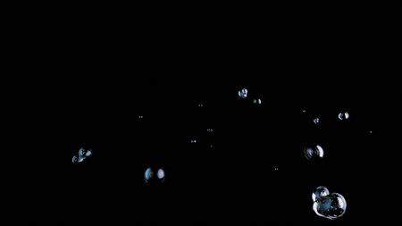 A 3D-rendered scene of water bubbles and liquid balls floating and splashing chaotically on a black background. The gurgling effect mimics underwater breathing, creating a dynamic, abstract pattern.の写真素材