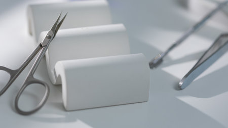 Minimalist manicure tools on light surface, clean elegant beauty salon close-upの写真素材