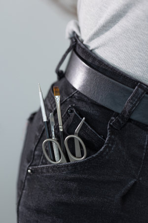 Playful manicure essentials in denim, capturing a nail masters love for their craft in a pocket.