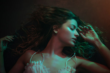 Beautiful young woman, portrait lying down, caustic glare from water on her face, mystical portrait