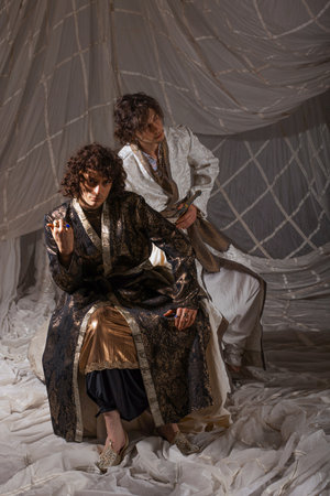 Oriental male models in exquisite Arabic costumes, professional cultural portrait sessionの写真素材