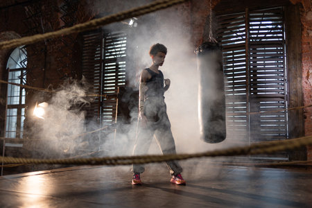 Boxing with a punching bag, sports achievements concept, cinematic image, mood, motivating stories