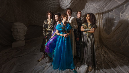 Arabian Nights inspired group portrait, models in authentic Turkish costumes, dreamy setting