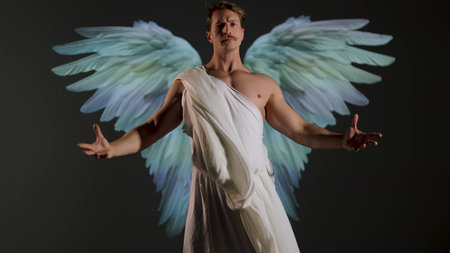 A battle angel in a white tunic, a concept in the antique style or in the style of Renaissance painting, a muscular young manの写真素材