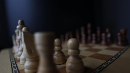 Rotating chessboard with strategically placed pieces in motion, depicting the eternal struggle...
