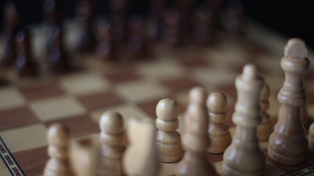 Animated sequence showing chess pieces on revolving board, capturing the essence of strategic...
