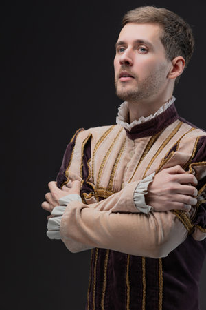 Romano, a romantic hero of a medieval setting, a young man in a costume from the early Renaissance...