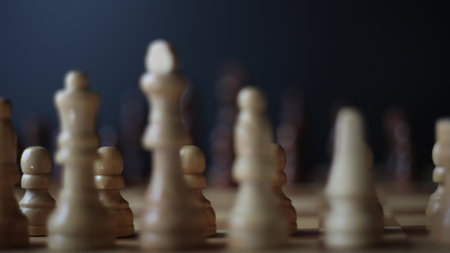 Animated sequence showing chess pieces on revolving board, capturing the essence of strategic decision-making and the black versus white dichotomy in chessの写真素材
