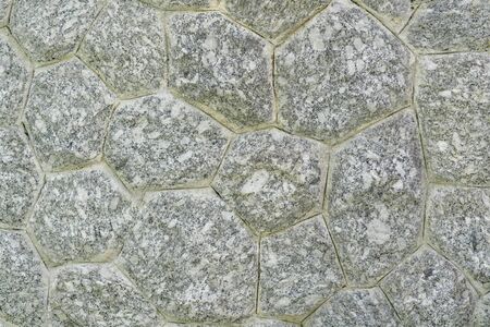 Texture of a stone wall. Old castle stone wall texture background. Part of a stone wall, for...