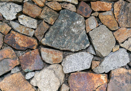 Texture of a stone wall. Old castle stone wall texture background. Part of a stone wall, for...