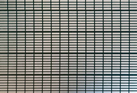 Background texture of striped pattern of metal escalator foot step.