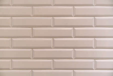 Texture for facing the walls of the pool, bathroom, kitchen, tiled floor. Rectangular background mosaic, ceramics. Abstract pixels. Ceramic tilesの写真素材