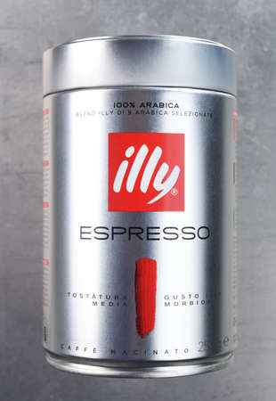 Warsaw, Poland - March 9, 2020: Bank of Italian coffee Illy on a gray background.