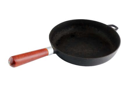 Black frying pan with a non-stick coating, isolated on a white backgroundの写真素材