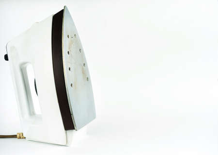 Steam iron isolated on white background.iron housework ironed electric tool clean white background ironing steam housekeepingの写真素材