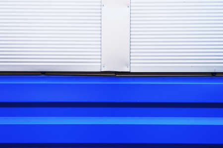 Blue line on striped metal background. Stripe pattern.の写真素材