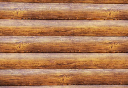 Metal lining on the facade of the building imitating the texture of wood.Element of the facade. Part...