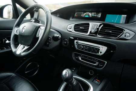Belarus, Minsk-October 6, 2019: Black car Renault Grand Scenic, close-up of the dashboard, player.のeditorial素材